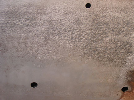 Pitting and holes revealed 1