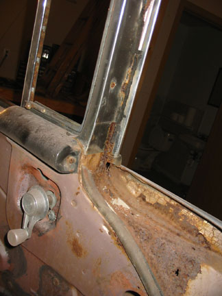 Original door rust damage