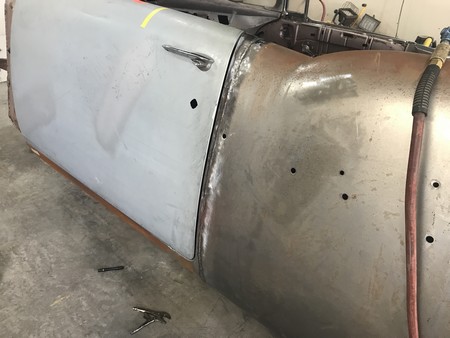 Welds dressed, door hung