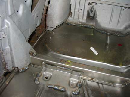 Driver riser welded